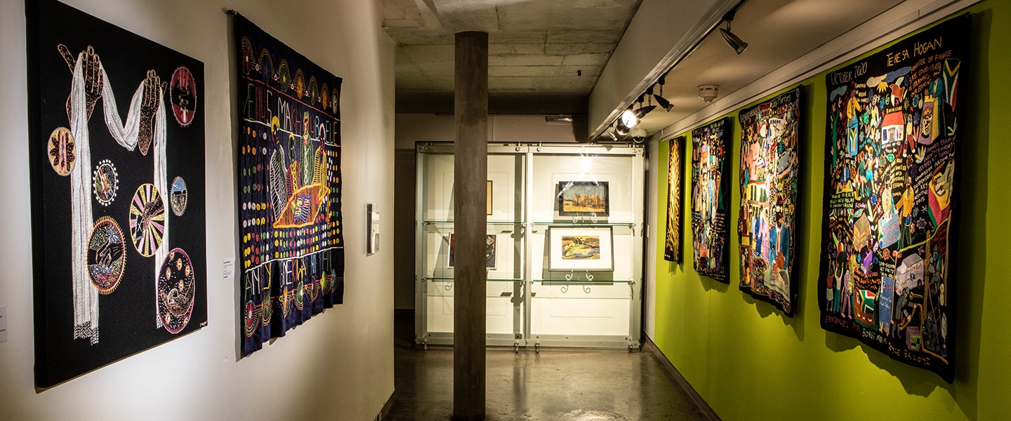 10 tapestries sewn by the Mapula Embroidery Trust on display at WAM TENX exhibition